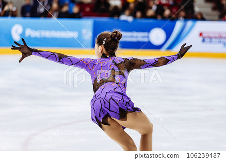 close-up girl figure skater in purple dress, figure skating single 106239487