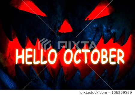 Lettering Hello october. Scary smiling Halloween pumpkin on dark background. Lettering Hello october. Scary smiling Halloween pumpkin on dark background. 106239559