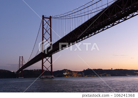 highlighted April 25 Bridge over the Tagus river At Sunset 106241368