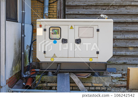 Power Generator Behind Building Power Generator Behind Building 106242542