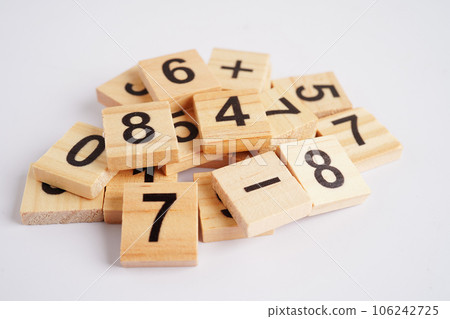 Number wood block cubes for learning Mathematic, education math concept. 106242725