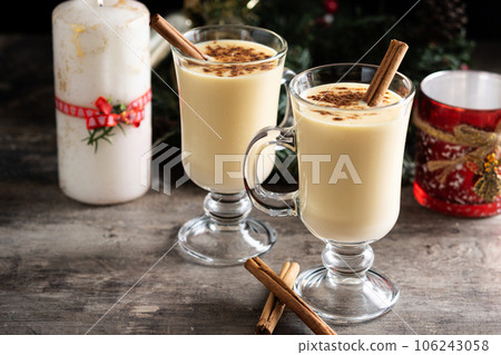 Eggnog Glasses Cinnamon Wooden Table Stock Photo by ©5seconds