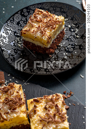 Chocolate cake with coconut shavings Chocolate cake with coconut shavings 106244103