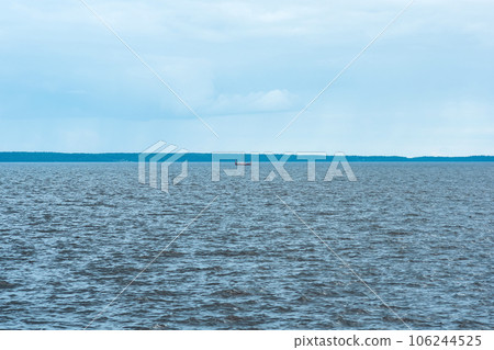 waterscape of Lake Onega, the silhouette of drakkar is visible in the distance waterscape of Lake Onega, the silhouette of drakkar is visible in the distance 106244525