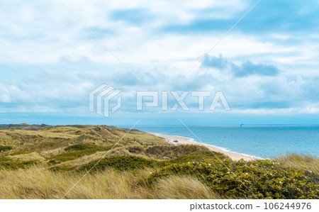Landscape on Sylt island with the North Sea and the marram grass hills Landscape on Sylt island with the North Sea and the marram grass hills 106244976