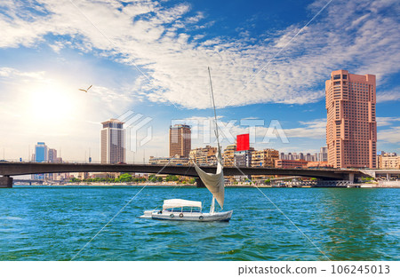 Bridge over the Nile, river board and fancy buildings of Cairo, beautiful day view, Egypt 106245013