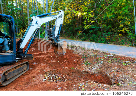 Tractor driven ditch digging for laying drainage concrete sewage a pipe 106246273