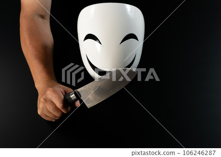Kitchen knife and spooky mask 106246287