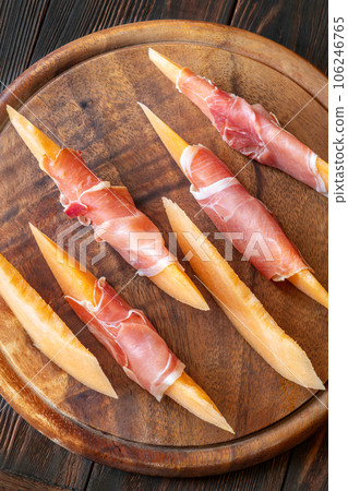 Prosciutto wrapped melon Prosciutto wrapped melon 106246765