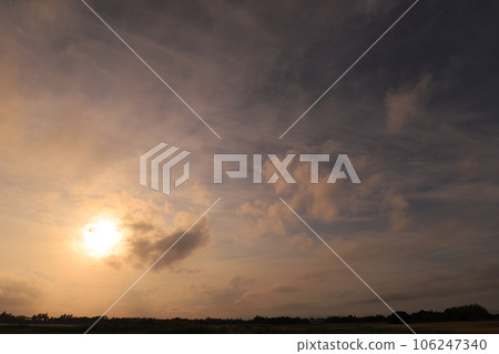 A cloud that stains in the sunset A cloud that stains in the sunset 106247340