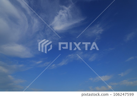 White clouds in blue sky 106247599