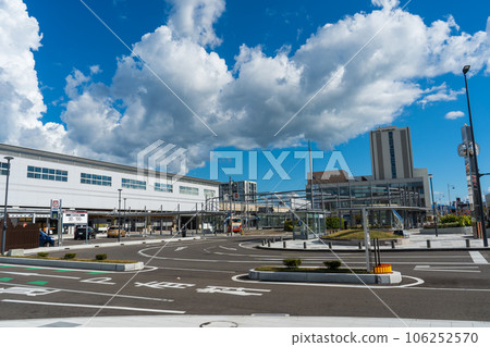 Sunny blue sky and scenery in front of Hokuriku Shinkansen Komatsu Station (West Exit) | Komatsu City, Ishikawa Prefecture 106252570