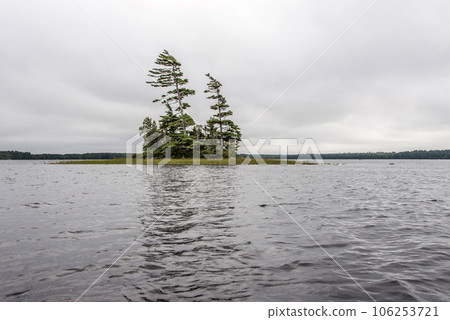 river and islands in morning mist at Kejimkujik National Park Designated Canoe ride Wilderness Nova Scotia Canada 106253721