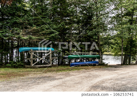 Canoe ride lending on river islands in morning mist at Kejimkujik National Park Designated Wilderness Nova Scotia Canada Canoe ride lending on river islands in morning mist at Kejimkujik National Park Designated Wilderness Nova Scotia Canada 106253741