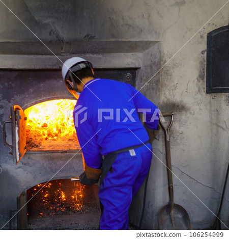 The person who puts fire in the kettle The person who puts fire in the kettle 106254999