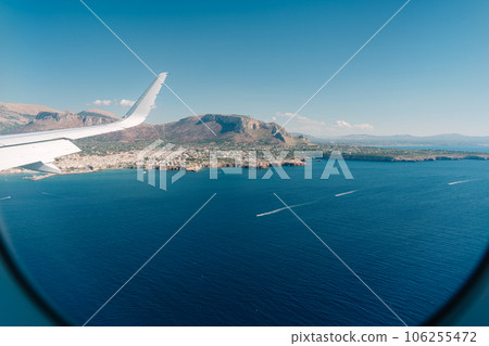 Sicily, a vacation destination seen from an airplane window 106255472