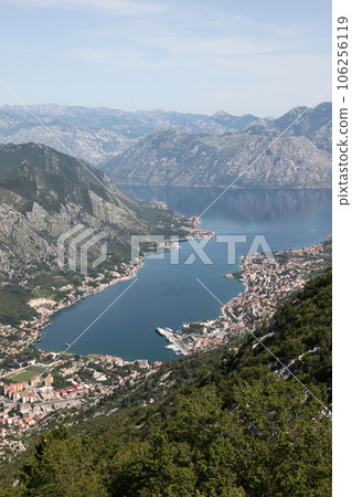 Bay of Kotor with high mountains plunge into Adriatic sea and Historic town of Kotor, Montenegro Bay of Kotor with high mountains plunge into Adriatic sea and Historic town of Kotor, Montenegro 106256119