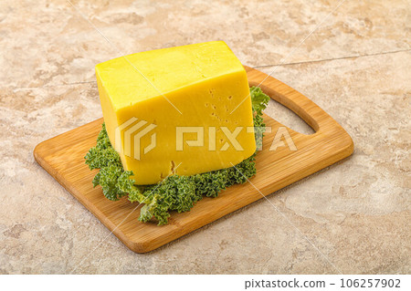 Yellow tilsiter cheese dairy product Yellow tilsiter cheese dairy product 106257902