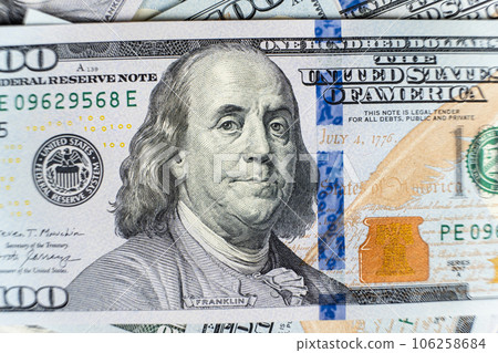 A lot of 100 dollar bills close-up macro. 106258684