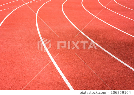 red running track on athletic stadium background texture 106259164