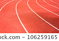 red running track on athletic stadium background texture 106259165