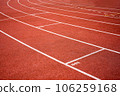 red running track on athletic stadium background texture 106259168