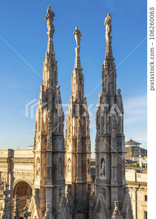 The spires and pinnacle sculptures on the roof of the Milan Cathedral 106260068