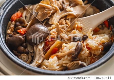 Rice cooked with plenty of mushrooms Rice cooked with plenty of mushrooms 106260411