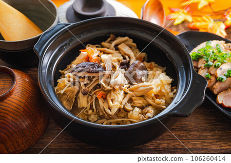Mushroom rice cooked in a clay pot Mushroom rice cooked in a clay pot 106260414