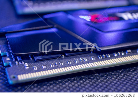 DDR4 DRAM computer memory hardware in blue light DDR4 DRAM computer memory hardware in blue light 106265268