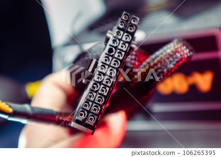 Cable connector from PC power supply unit close-up 106265395