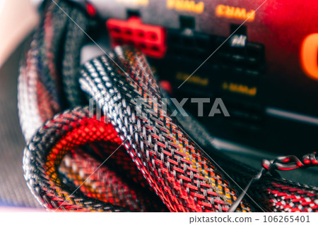 Cables on power supply unit of desktop PC close-up 106265401