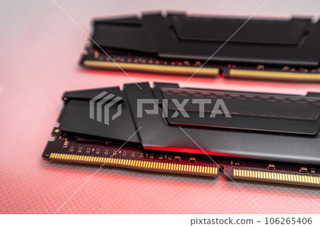 DDR4 DRAM memory modules close-up in red light DDR4 DRAM memory modules close-up in red light 106265406
