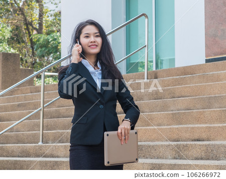 Businesswoman talking on phone 106266972