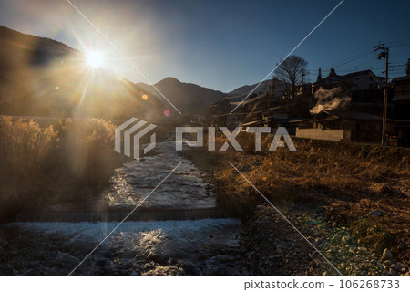Shibu onsen town with cascading water river at sunrise, Yamanouchi 106268733