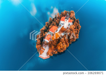 Aerial view of beautiful church on the island on the Bled Lake Aerial view of beautiful church on the island on the Bled Lake 106269071