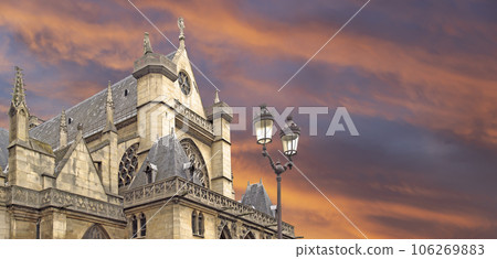 Great gothic church of Saint Germain l Auxerrois (against the background of a sky at sunset), Paris, France 106269883