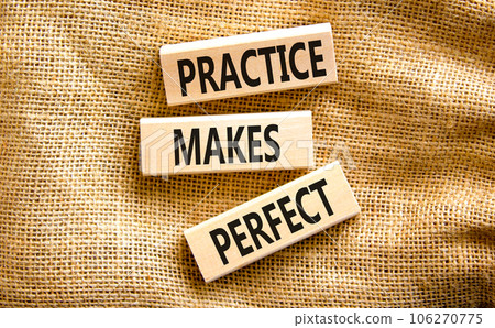 Practice makes perfect symbol. Concept words Practice makes perfect on wooden block. Beautiful canvas table canvas background. Business practice makes perfect concept. Copy space. 106270775
