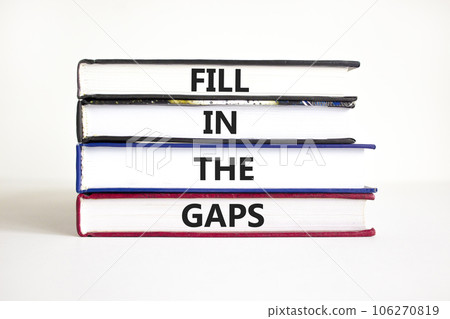 Fill in the gaps symbol. Concept words Fill in the gaps on books on a beautiful white table white background. Business, motivational and fill in the gaps concept. Fill in the gaps symbol. Concept words Fill in the gaps on books on a beautiful white table white background. Business, motivational and fill in the gaps concept. 106270819