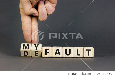 Default is my fault symbol. Concept words Default and My fault on wooden cubes. Beautiful grey table grey background. Businessman hand. Business default is my fault concept. Copy space. Default is my fault symbol. Concept words Default and My fault on wooden cubes. Beautiful grey table grey background. Businessman hand. Business default is my fault concept. Copy space. 106270839
