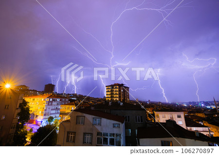 View of stormy sky with lightning strikes over the city of Istanbul at night 106270897
