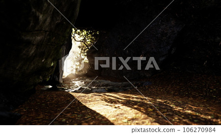 Empty road goes through the cave with glowing end 106270984