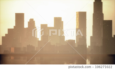 Beautiful sun ray over downtown during hazy sunrise 106271022