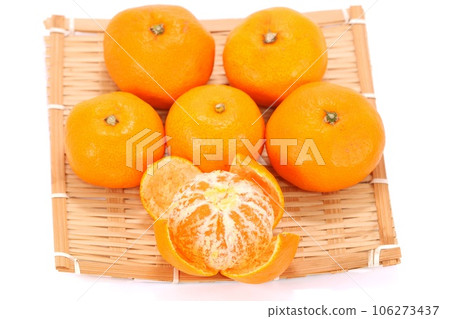 Yellow mandarin orange peeled bright background Yellow mandarin orange peeled bright background 106273437
