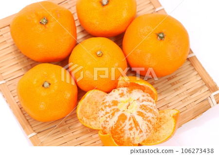 Yellow mandarin orange peeled bright background Yellow mandarin orange peeled bright background 106273438