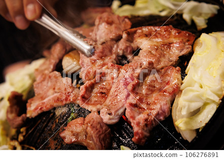 Bake raw lamb in a Genghis Khan pot Bake raw lamb in a Genghis Khan pot 106276891