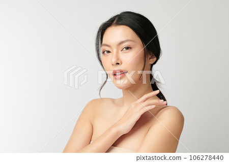 Beautiful young asian woman with clean fresh skin on white background, Face care, Facial treatment, Cosmetology, beauty and spa, Asian women portrait. Beautiful young asian woman with clean fresh skin on white background, Face care, Facial treatment, Cosmetology, beauty and spa, Asian women portrait. 106278440