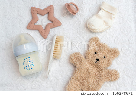 Collection of newborn's accessories in top view, essential things for infant comfort and care, flat lay style 106278671