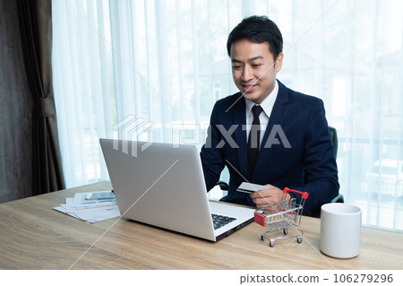 man shopping online 106279296