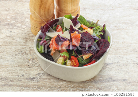 Mix salad with salmon, corn and tomato Mix salad with salmon, corn and tomato 106281595